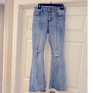 Mid Rise Button Front Flare Denim Jeans
